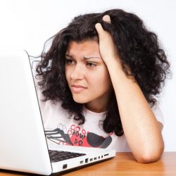 woman-frustrated-at-laptop
