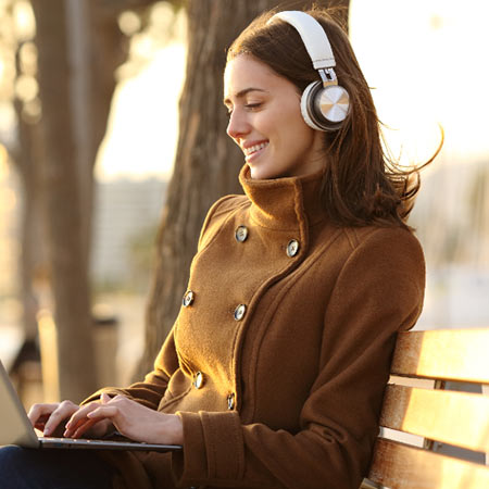 Young woman outside on a bench